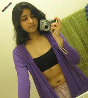 18 year old beauty Agnes takes great care in flaunting perky tits in the nude